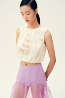 Chictopia Lois lilac midi skirt displayed on a hanger, featuring flowing fabric and a stylish, versatile design for everyday wear.