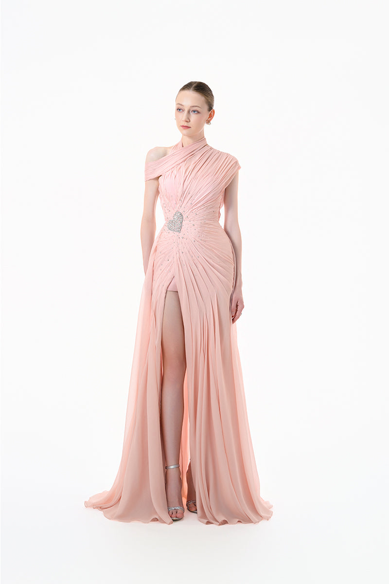 Blush pink pleated draped maxi gown by Happy Clothing, flowing fabric with elegant pleats and a sophisticated design.