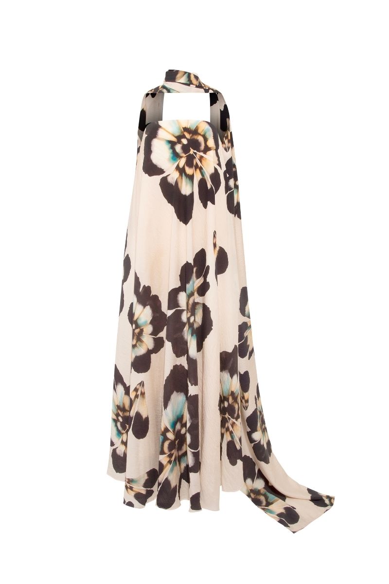 Sisters Lucy maxi dress in sandstone beige fabric, featuring a flowing silhouette and elegant style, suitable for summer wear.