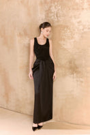 Arti Apparel Laurent maxi skirt in flowing fabric with a relaxed fit, displayed on a hanger against a neutral background.