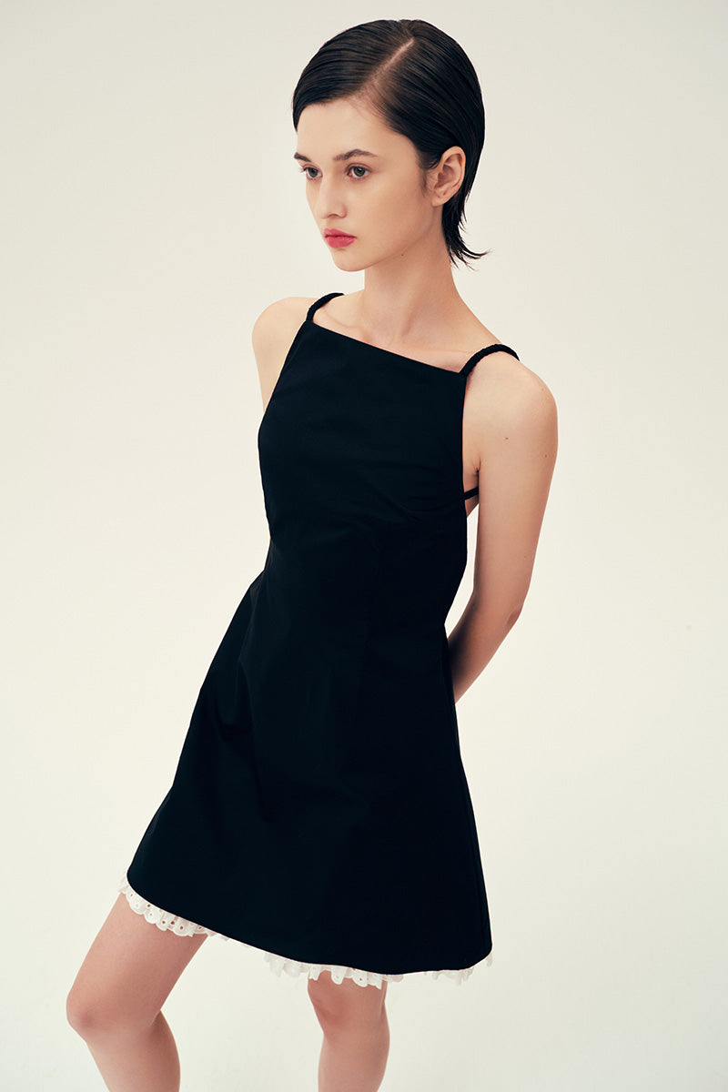 Black LINDA mini dress by Chictopia, featuring a stylish fit and elegant design, shown on a model in the image.
