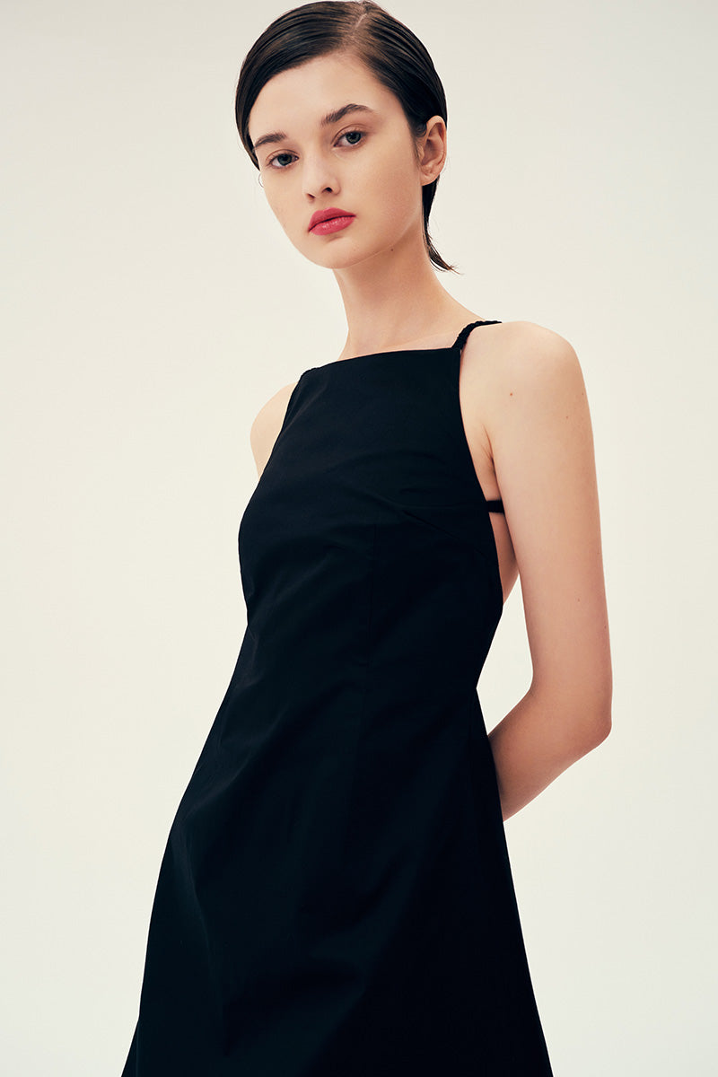 Black Linda mini dress by Chictopia, stylish sleeveless dress with a fitted silhouette and elegant design.