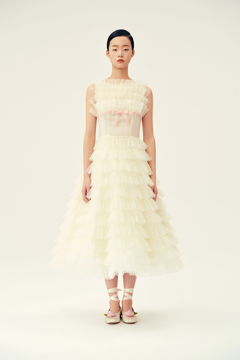 Chictopia ivory Deborah midi dress displayed on a hanger, showcasing its elegant fabric and classic design suitable for special occasions.