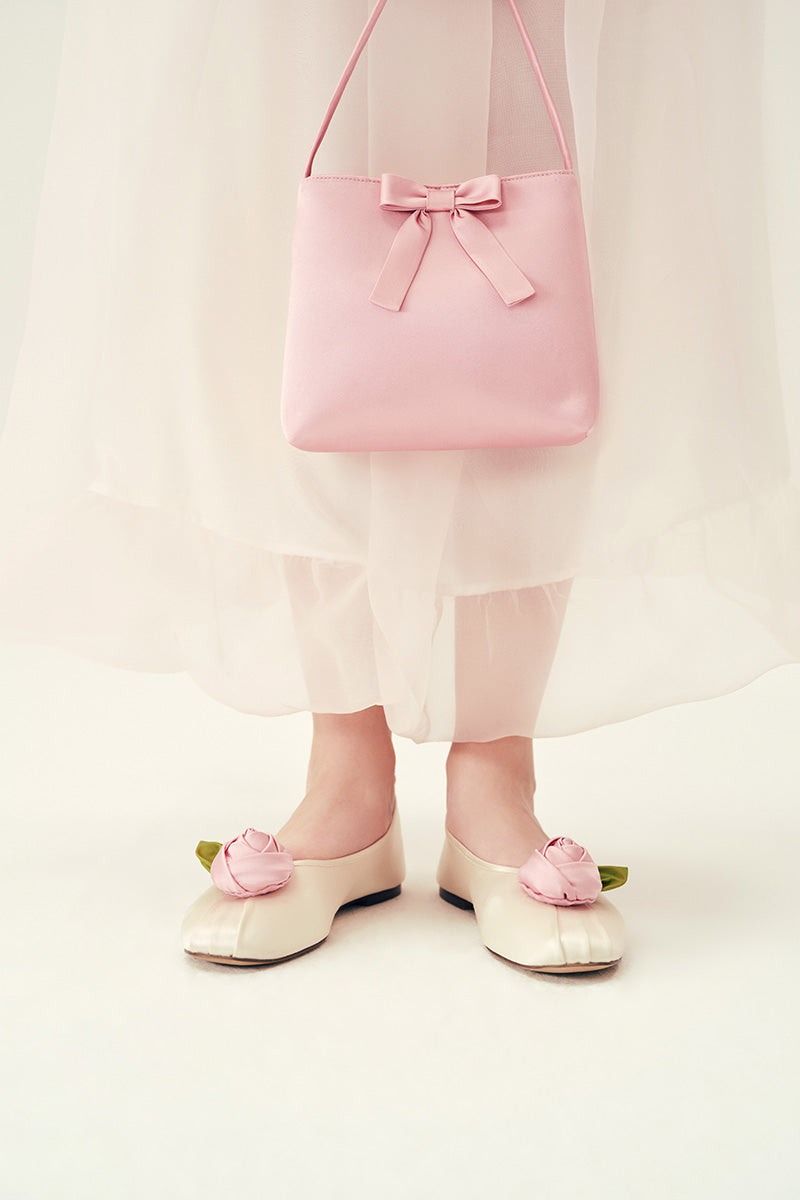 Chictopia satin rose flats in ivory with bow detail, stylish women's flat shoes for elegant and comfortable wear.