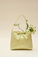Mint Ribbon Bow Handbag by Chictopia, stylish top handle bag with a ribbon bow detail, perfect for elegant daytime wear.