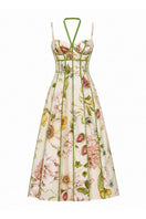 BY HAÓ Amoréa bustier maxi dress in flowing fabric, featuring a fitted bodice and full-length skirt.