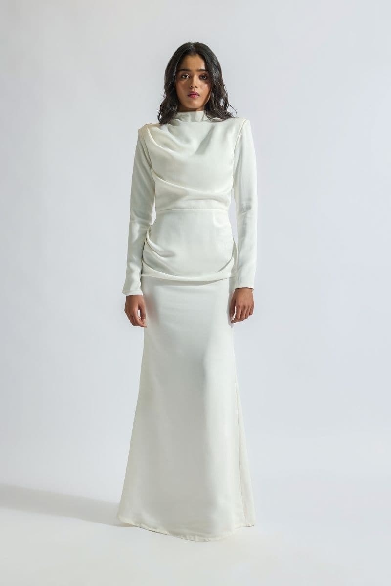 Deme by Gabriella CULT MIA X DEME maxi dress in flowing fabric with floral pattern, sleeveless design, and elegant silhouette.