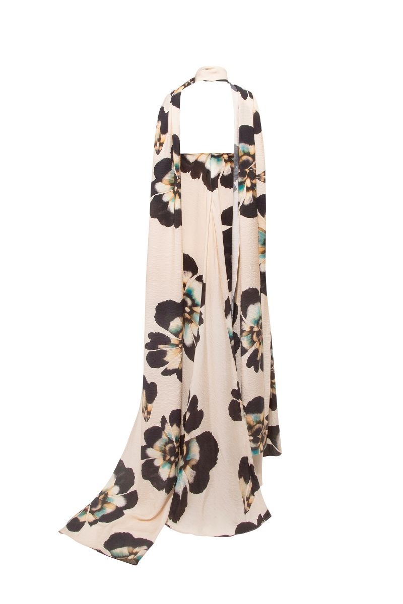 Sisters Lucy scarf in sandstone beige, styled with a maxi dress, showcasing soft fabric and neutral color for elegant summer wear.