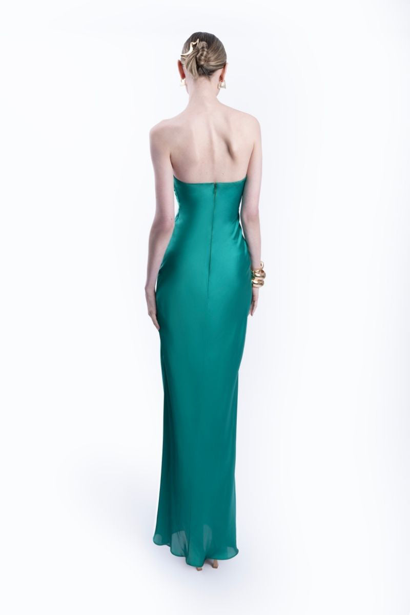 LEDIEL Kaya gown in emerald green, elegant evening dress with flowing fabric and detailed design, perfect for formal occasions.