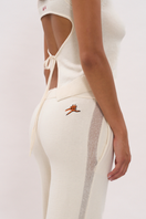 Cream women's pants by La Granni featuring a relaxed fit and stylish design, shown on a model.