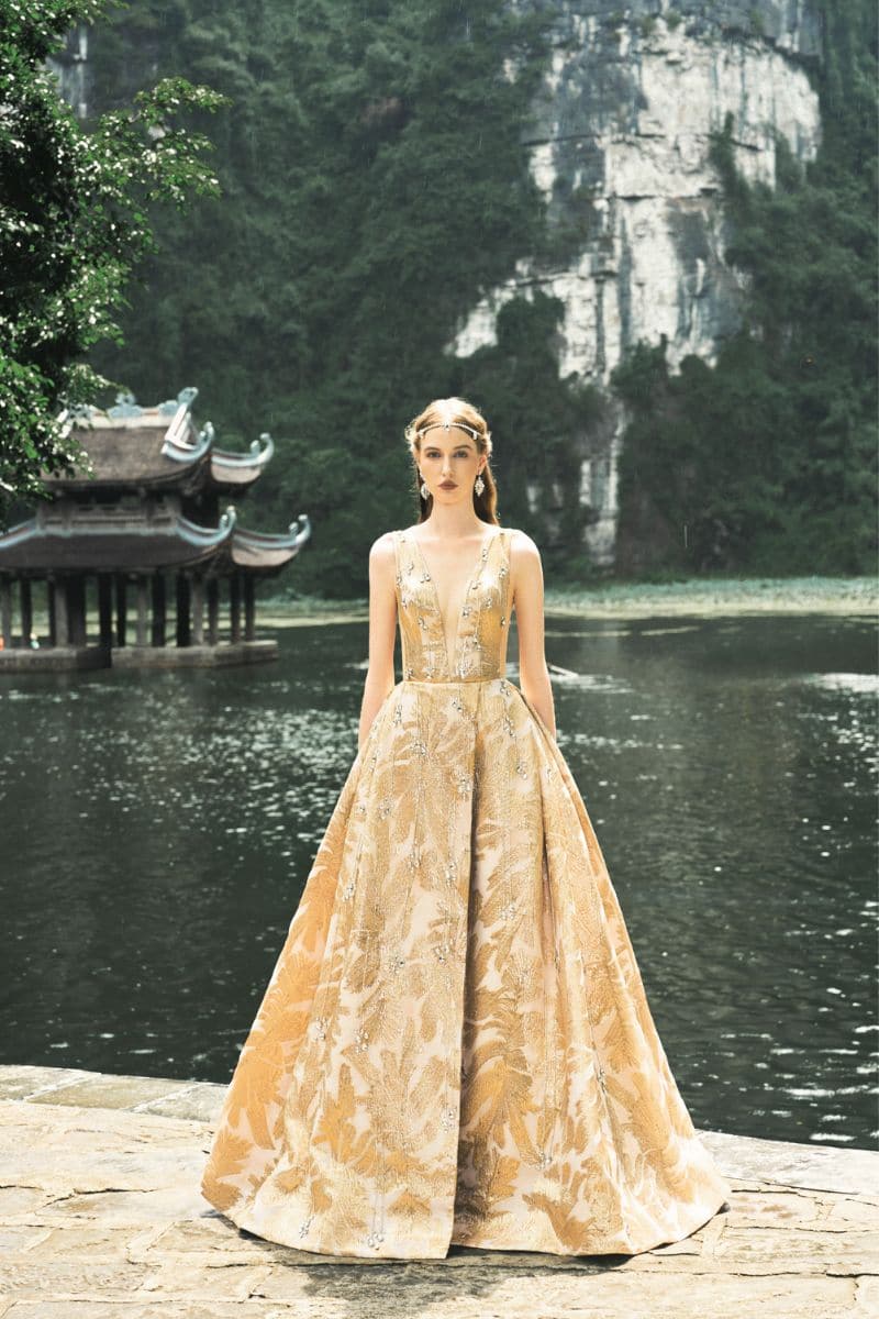 GOLDEN SLEEVELESS DEEP V-NECK GOWN | CULT MIA | Tracy Studio GOLDEN SLEEVELESS DEEP V-NECK GOWN | CULT MIA | Tracy Studio