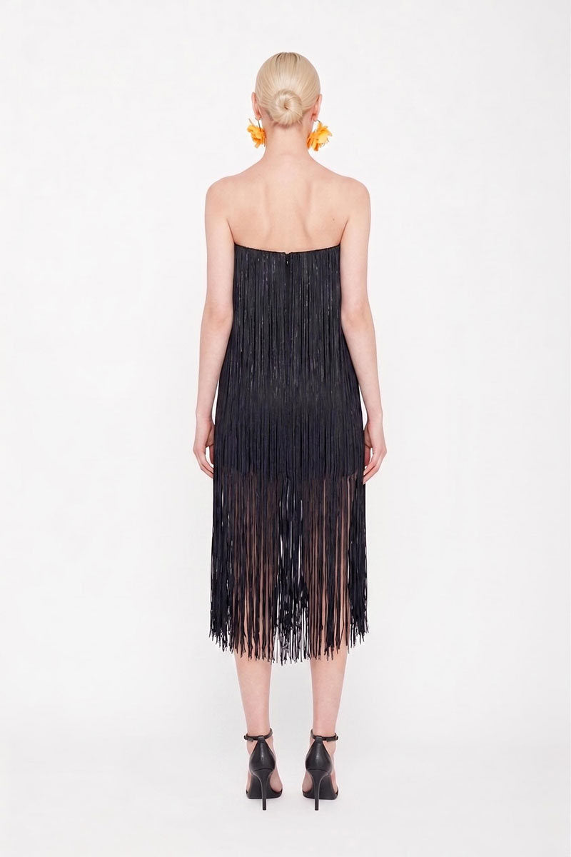 Black Valenciani all-over fringe midi dress featuring flowing fabric and fringe details, styled for a stylish occasion.