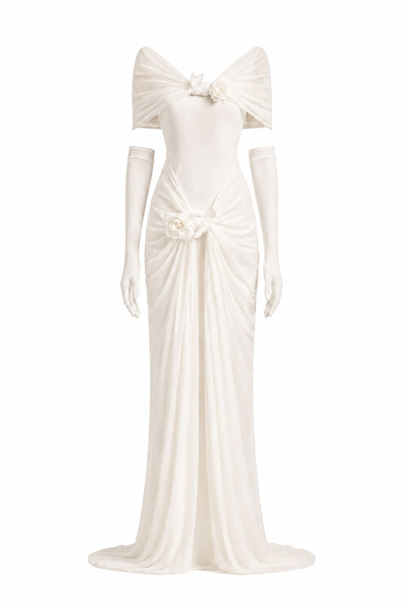 White Plan Francesca gown featuring elegant flowing fabric and intricate design, perfect for formal occasions.