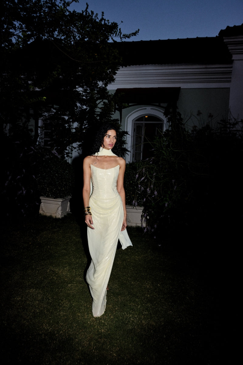 Elegant GISELLE gown by Deme By Gabriella featuring flowing fabric and intricate details, perfect for formal occasions.