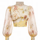 BY HAÓ VIRELLA TOP displayed on a hanger, featuring a lightweight fabric and stylish design, perfect for casual or dressy occasions.