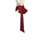 Three-tone burgundy bustier top by Stolen Stores, featuring a fitted design and stylish layered fabric details.