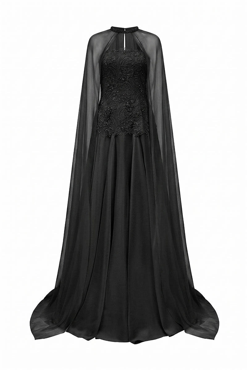 Black taffeta maxi dress with a cape from Tracy Studio, featuring elegant flowing fabric and a stylish, sophisticated design.