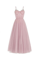 Elegant purple Evelyn gown by Joséphine, featuring flowing fabric and intricate design, perfect for formal occasions.