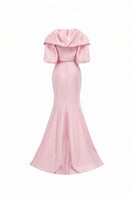 Pink taffeta mermaid gown with puffed cape by Tracy Studio, showcasing elegant design and detailed fabric texture.