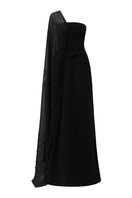 Black velvet satin gown with asymmetric cape sleeves by Tracy Studio, featuring elegant draping and a flowing silhouette.