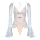 Blue floral cami top by Montsand featuring lightweight fabric and delicate floral pattern, shown on a neutral background.