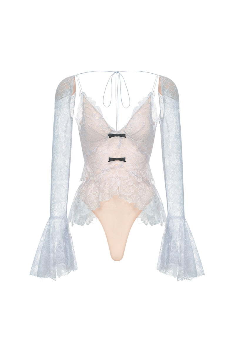 Blue floral cami top by Montsand featuring lightweight fabric and delicate floral pattern, shown on a neutral background.