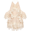 Ivory ruffled halter top by Montsand, featuring a stylish design with ruffle details and a halter neckline, perfect for trendy summer outfits.