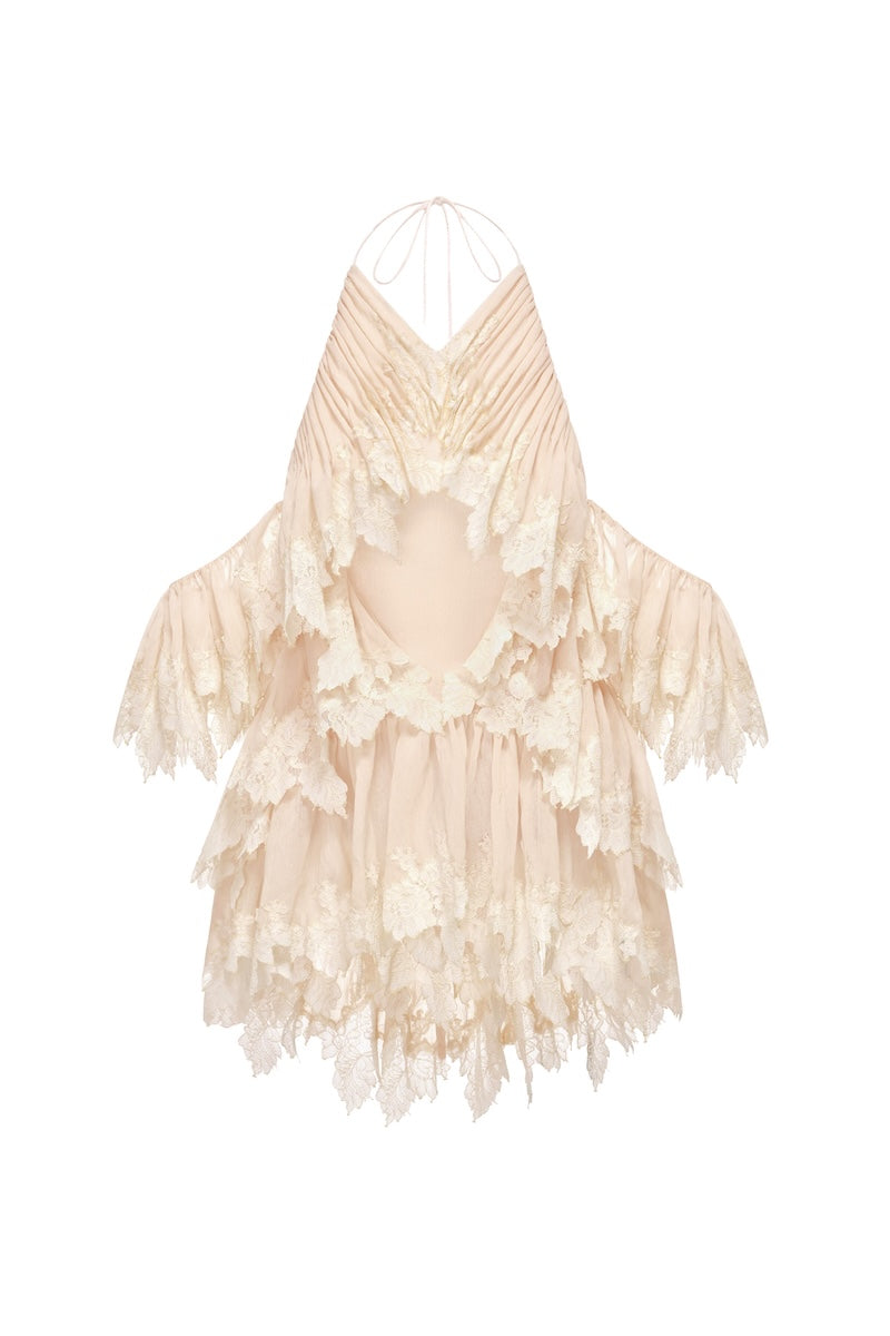Ivory ruffled halter top by Montsand, featuring a stylish design with ruffle details and a halter neckline, perfect for trendy summer outfits.