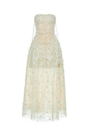 Montsand mint floral string maxi dress displayed on a hanger, featuring a flowing gown with floral patterns and adjustable straps.