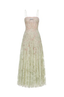 Mint green straight neckline pleated gown by Montsand, featuring elegant design and flowing fabric.