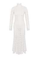 White turtleneck lace maxi dress by Nana Gotti, featuring a flowing silhouette and intricate lace details.