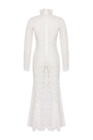 Nana Gotti white turtleneck lace maxi dress displayed on a model, featuring elegant lace details and a flowing silhouette.