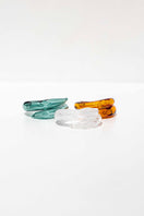 Set of three SALVÁREA rings featuring turquoise, amber, and white Remolino designs, displayed on a neutral background.