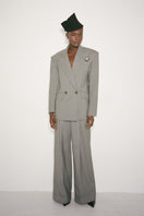 Nué Bowie blazer, stylish tailored blazer with notch lapels, shown in classic navy color, perfect for smart-casual or formal wear.