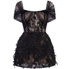 Black Bianca lace mini dress by 21Six, featuring intricate lace details and a fitted silhouette, perfect for stylish occasions.