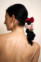 Three Tuscan Rose silk scrunchies from Not Just Pajama, soft pink silk hair accessories with a smooth, shiny finish.