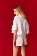 Nur Karaata Dorothy White Co-ords set featuring a stylish matching top and pants in crisp white fabric.