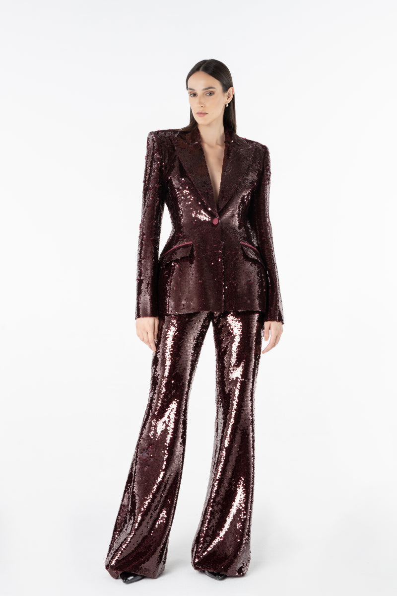 Lili Blanc Sequin Peak Blazer in black with shimmering sequin details, tailored fit, and classic blazer silhouette.