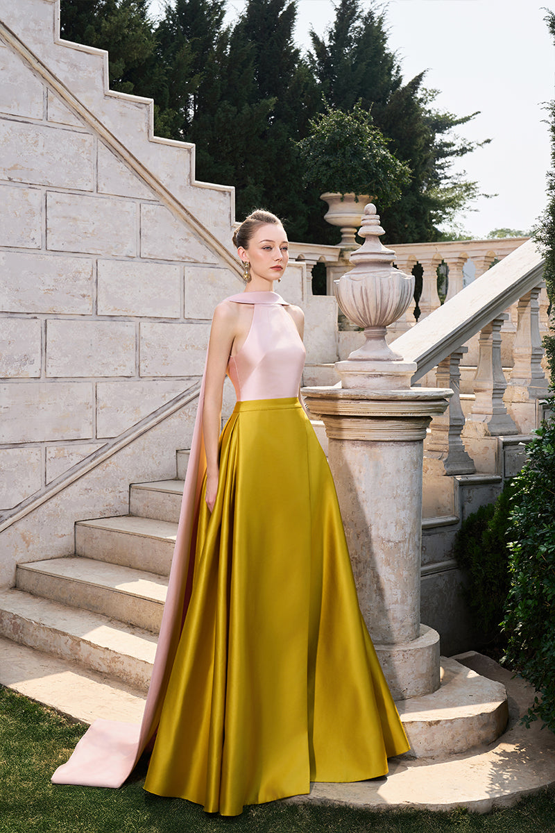 Pink and yellow bamboo taffeta gown by Tracy Studio, featuring elegant fabric and flowing design, shown on a model.
