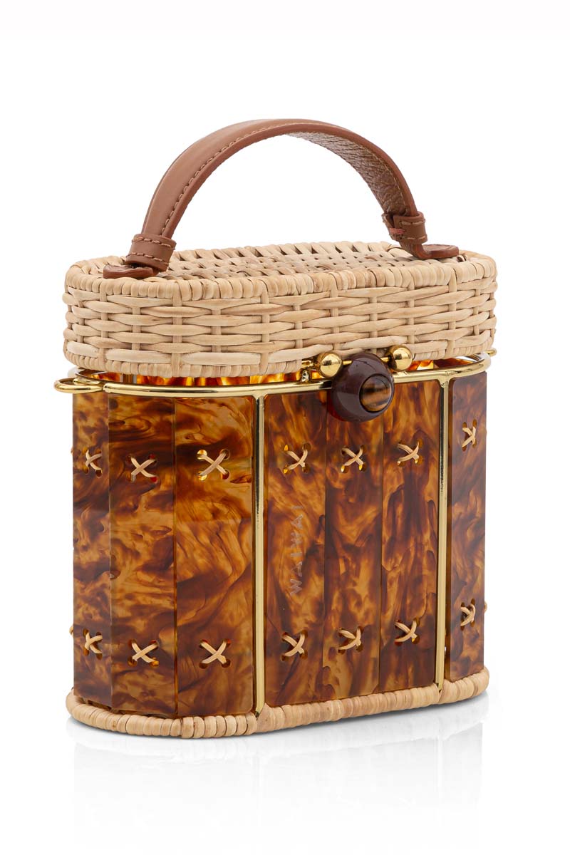 Waiwai Rio Copan Turtle top handle bag with a textured turtle pattern and a sturdy handle, stylish and functional for daily use.