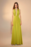 Green glow INES jersey long maxi dress by Nazlı Ceren, flowing fabric with a fitted waist and elegant neckline.