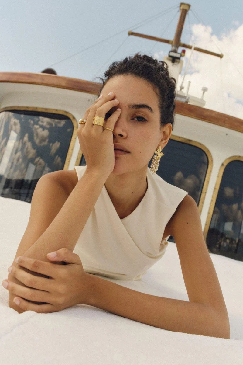 Peracas MINI Adile ivory earrings featuring small, elegant earrings with a delicate design and smooth ivory finish.