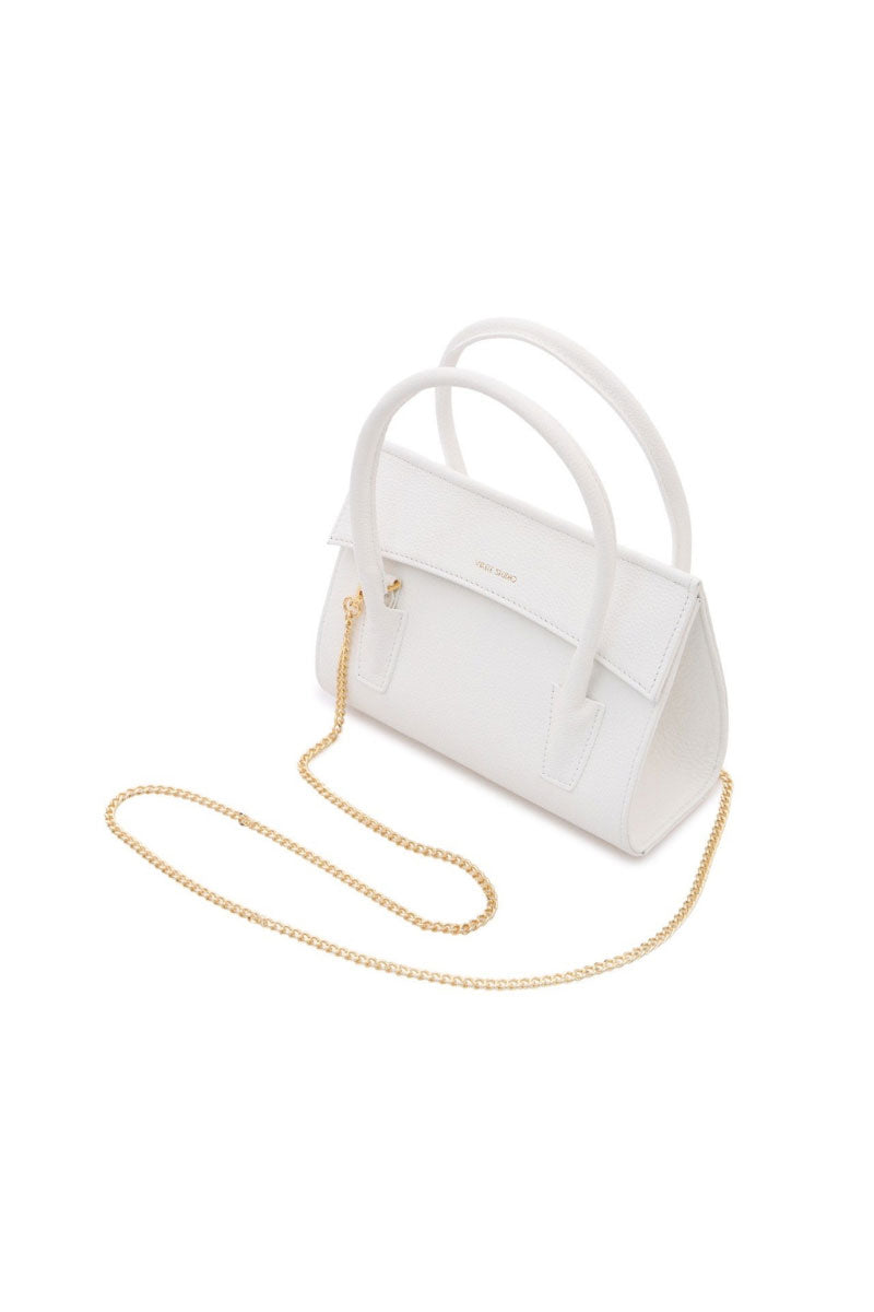 White CELINE mini top handle bag by VIKELE STUDIO with sleek design and compact size, perfect for stylish everyday use.
