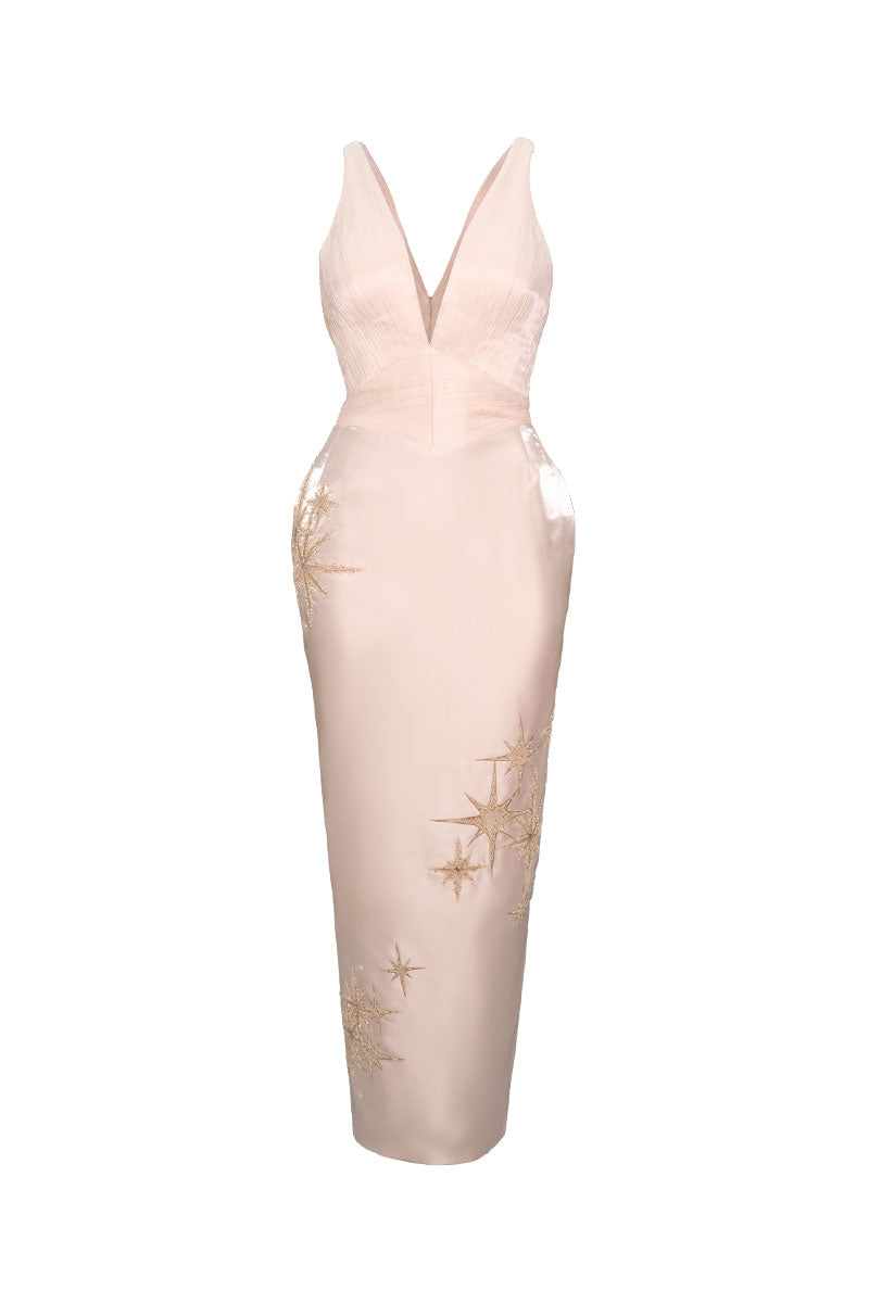 Do Long Starlight Pink Midi Dress featuring a flowing fabric and elegant design, shown on a model in a stylish setting.