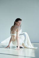 JINSUN botanically embellished ivory cupro gown with intricate details, flowing fabric, and elegant design.
