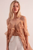 OvertheSea Solaris beige tunic cover-up with relaxed fit and lightweight fabric, displayed on a hanger.
