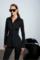 Black Acaria Studio scuba shirt featuring a sleek, fitted design with a smooth fabric texture and minimalist style.