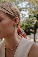 Peracas Magnolia earrings in baby blue with floral design, stylish dangle earrings for women.