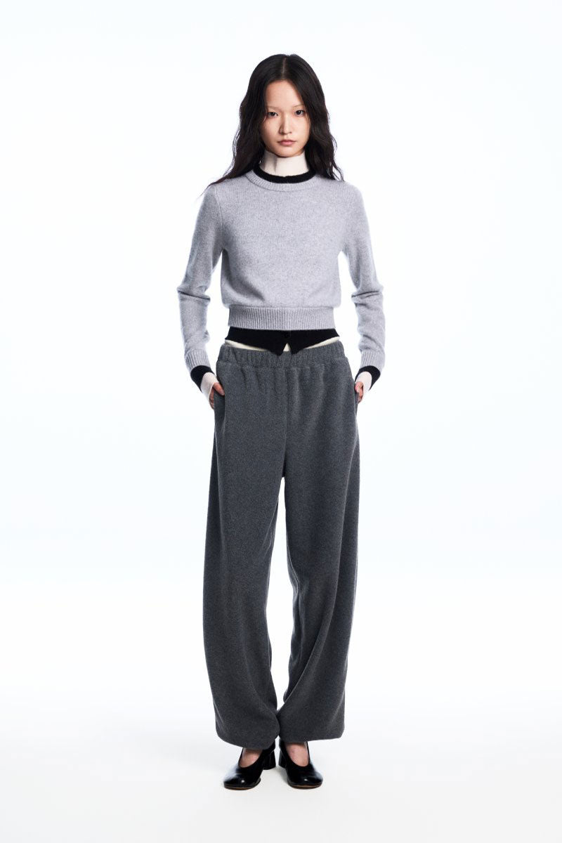 Chictopia layered grey cashmere sweater, soft knit with a stylish layered design, displayed on a plain background.