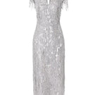 Elegant Raishma Amelia gown with flowing fabric and intricate detailing, perfect for formal occasions.
